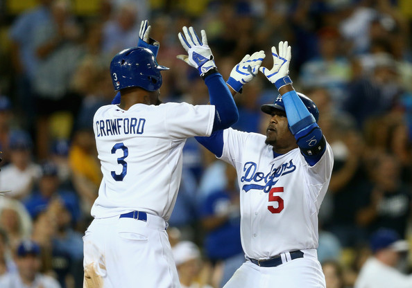 Juan Uribe conecta cuadrangular y los Dodgers vencen a Washington