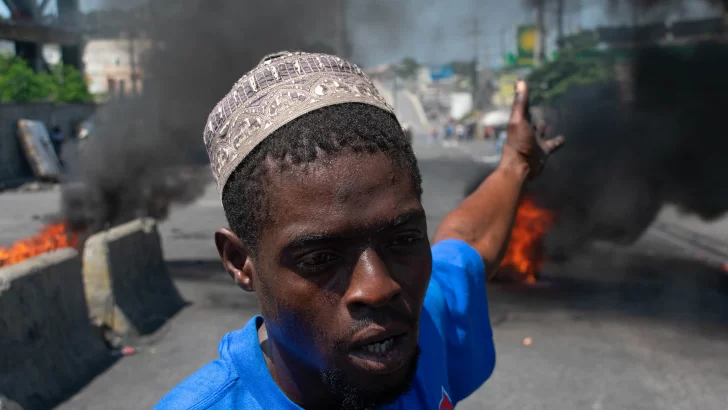 Haitianos se manifiestan en Puerto Príncipe para exigir la renuncia de Henry
