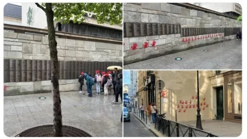 Manos rojas pintadas en la fachada del Memorial de la Shoá en París