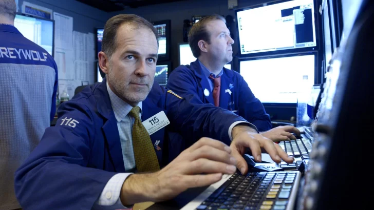 Wall Street cierra mixto después de que la Fed reportara 