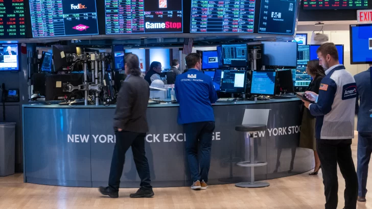 Wall Street cierra mixto por optimismo en la FED sobre bajar tipos
