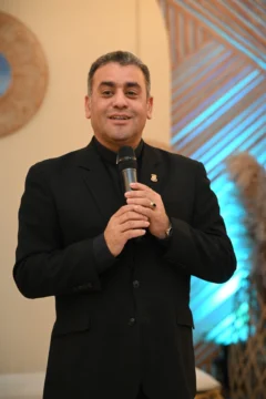  El rector de la UCNE, reverendo padre doctor Isaac García de la Cruz.