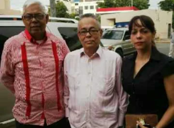  Nelson, Carlos y Jessenia Serret antes de ser encarcelados.