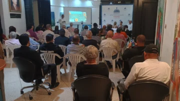  Público que asistió al Palacio Consistorial en Santiago al lanzamiento de El Visible Amante, poemario de Máxima Hernández, vicepresidente del Centro PEN RD.