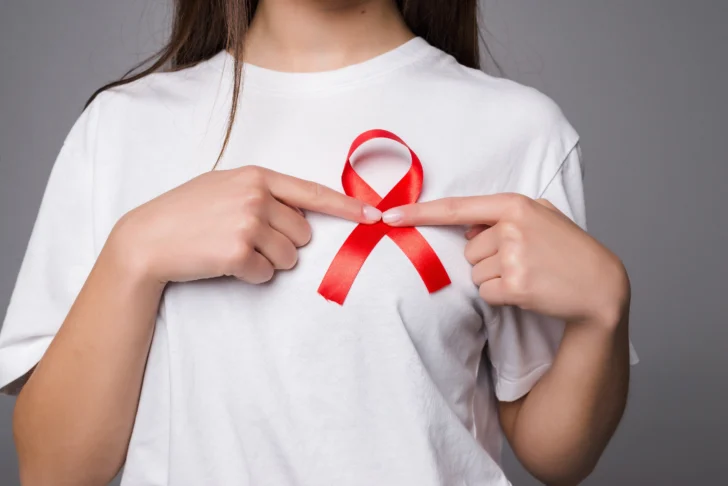 world-breast-cancer-day-concept-health-care-woman-wore-white-t-shirt-with-pink-ribbon-awareness-symbolic-bow-color-raising-people-living-with-women-s-breast-tumor-illness-728x486