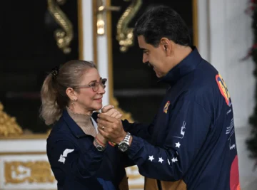  Maduro y Cilia Flores November 21, 2025. (Photo by Juan BARRETO / AFP)