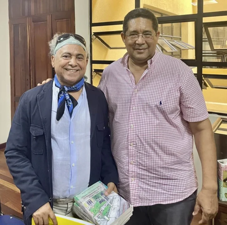  Radhamés Polanco y el pintor Hilario Olivo.