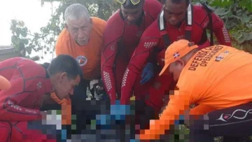 Buzos encuentran cuerpo del motorista que cayó al río Isabela desde puente Jacinto Peynado